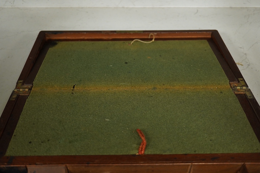 A 19th century brass handled figured mahogany writing slope, 42cm wide, 16cm high. Condition - brass inset plaque to top missing